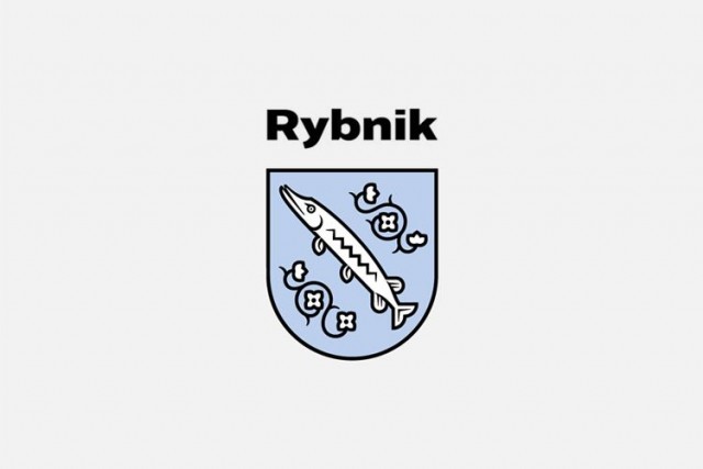 Herb Miasta Rybnika biały szczupak na niebieskiej tarczy.